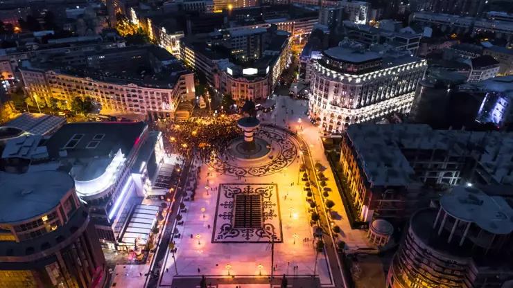 Panoramic view of Skopje cityscape, showcasing its unique blend of historical landmarks and modern architecture.